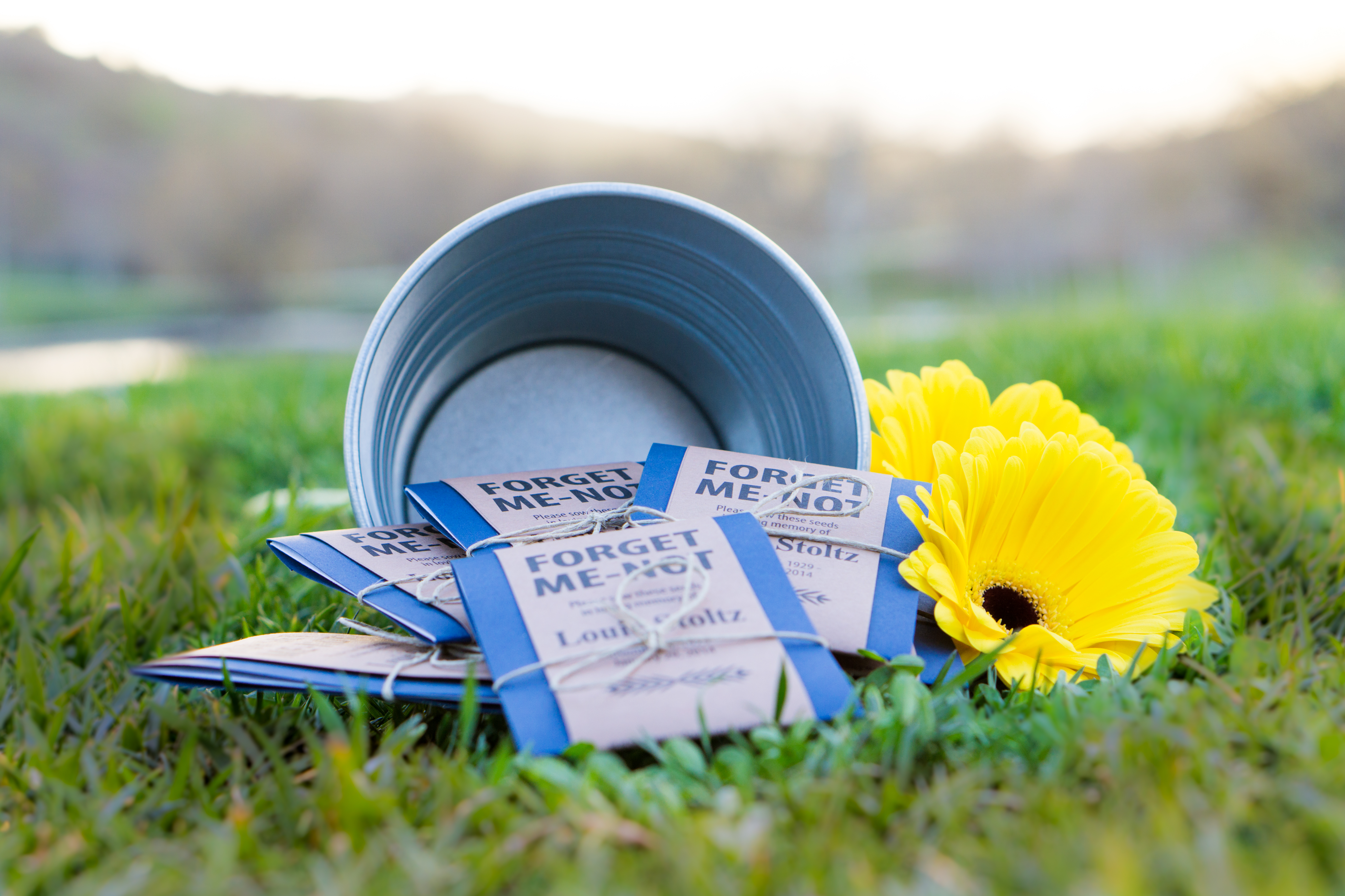Forget me not memorial flower seed packets in tin can by Gloria's Garden